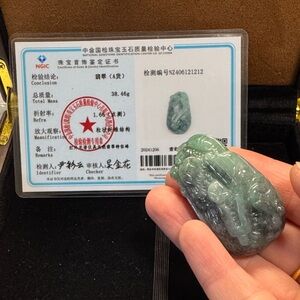 Green untreated Myanmar Jadeite Carved Pendant